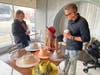 During a recent coffee shop interview to talk about her business and her dedication to mental health awareness, Lauren Sharp and her ornate hats repeatedly drew the attention of intrigued shop customers such as Dana Ferguson and David Arroyo. 