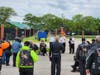 Participants gather in a parking lot at the Lovell Federal Health Care Center for a pre-ride ceremony before the 2024 Rolling Thunder mid-America Demonstration Parade. This year's event will be Sunday, May 25.