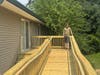 U.S. Army Sgt. Retired Johnathan Draper of Lakemoor looks toward the new ramp on the completely rebuilt back deck that Lennar homebuilders provided as part of the 30 Days for 30 Vets program.