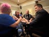 Sitting with Midwest Mystic Joe Diamond for a post-show seance on a recent Friday were (clockwise, from left) Angie ZXUH, Peggy Zamp and Dan Zamp, all of Crystal Lake.
