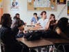 A group of students in Christy Biancullo’s Crime Scene Investigation class listen for “clues” during a class lecture on opening day at Banning High School. 