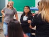 Janessa Diaz (left) and Mariangel Alcaraz during an impromptu class discussion kicking off the school year at Nicolet Middle School.