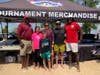 Waukegan Mayor Sam Cunningham (left) stands with Soccer in the Sand organizers and Heart of the City Executive Director, Scott McLellan