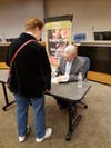 Alan Brennert signing his new book for excited fans.