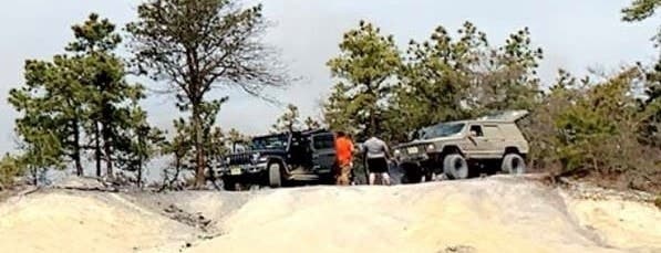 New Jersey state police are seeking the public's assistance in identifying two men connected with the recent wildfire.