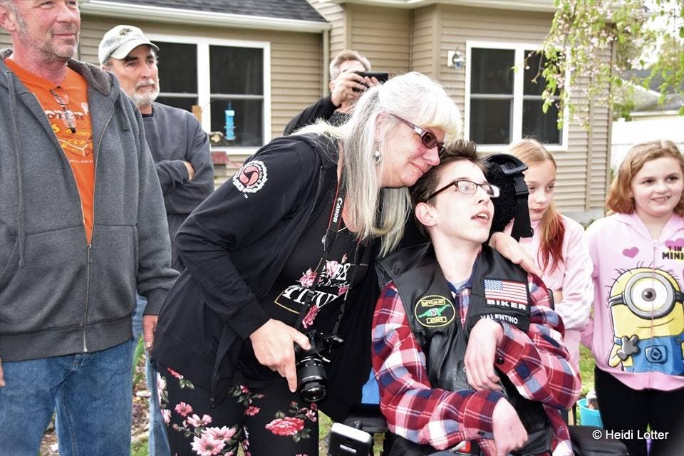 The Bayville Elks and community members celebrated Val Falzarano's new handicap-accessible bedroom and bathroom.