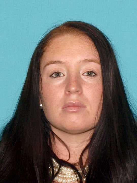 A woman assumed a false identity to work as a nurse aid in Barnegat, officials said.