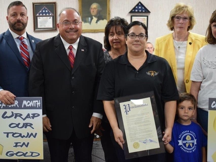 Mayor Carmen F. Amato (second to left) and Township Council paid tribute to Emiliana O'Brien, who battled childhood cancer.