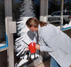Heather Henry created seasonal paintings on the windows of three Ocean City businesses: JiLLy's Arcade, Avalon Flooring and Impala Island Inn.