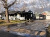A woman suffered burns and was airlifted during a Pine Beach house fire, officials said.