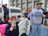 People gather for the Wildwood rally, including a miniature Donald Trump.