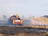 Officials extinguished a brush fire Monday afternoon from an open field in Manahawkin.