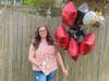 Taylormarie Capoziello celebrates her graduation from St. John's in her Bayville backyard.