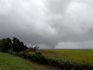 Witness footage shows a tornado just east of the Garden State Parkway near Ocean City at about 10 a.m. Tuesday.