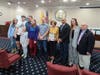 Parsippany Mayor Michael Soriano (third from right) and Council President Michael dePierro (first from right) stand with William Taylor's loved ones after Soriano presented a proclamation honoring Taylor.