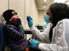 LabQ Diagnostics phlebotomist Tiara McClain administers a test Monday at the Morris County COVID-19 testing site.