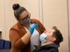  LabQ Diagnostics phlebotomy manager Breanna Iris administers a test Monday.