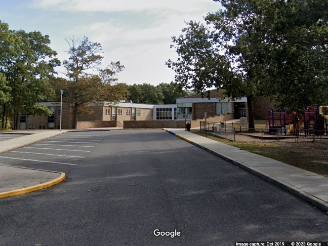 Authorities opened a homicide investigation after finding a dead man early Monday morning inside a vehicle at a South Jersey elementary school.
