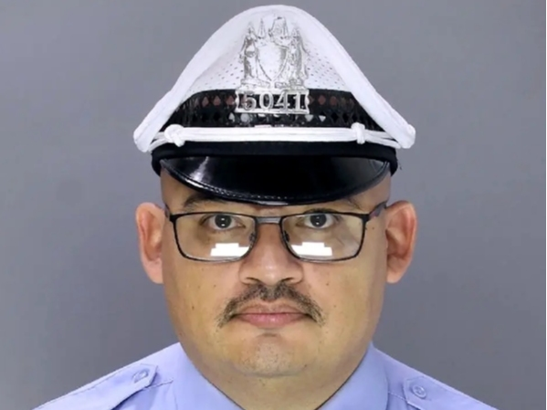 This undated photo released by the Philadelphia Police Department Office of Public Affairs shows Officer Richard Mendez.