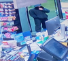 Two Manchester gas station stores were robbed early Monday morning in incidents that police believe are connected.