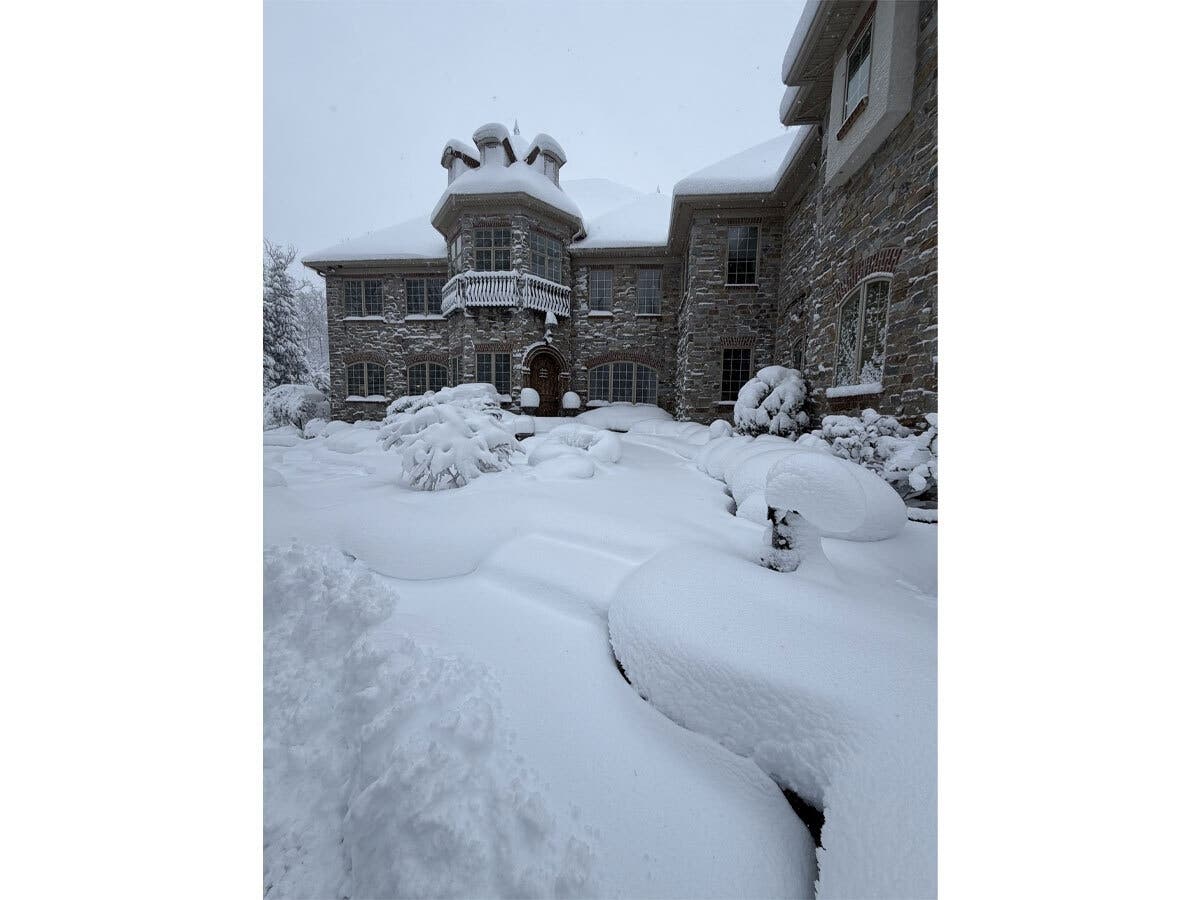 Snowfall in Cherry Hill's Wilderness Acres community.