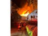 About 100 firefighters responded to a three-alarm blaze that destroyed a large house early Wednesday in the Villanova section of Radnor Township.