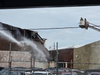 Firefighters battle a blaze at a Philadelphia building.