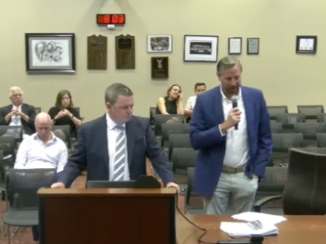 Restaurant owner Mike MacCrory, right, testifies before the Radnor Zoning Board.