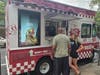 People for the Ethical Treatment of Animals (PETA) parked a food truck in front of Raising Cane's in Philadelphia to hand out free vegan chicken and lure people away from the restaurant.