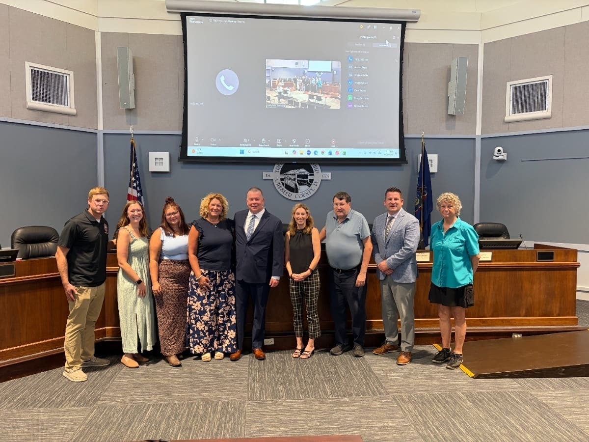 The Tredyffrin-Easttown Fire Commission appointed Eric Felker, center, as chief of fire and emergency medical services.
