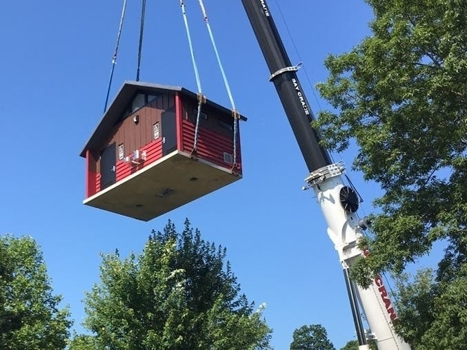 New restrooms arrived at Miantonomi Park via crane last week. 