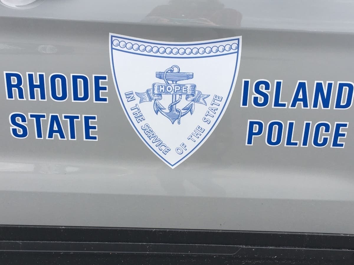 An off-duty Providence police officer crashed into a state police cruiser with a trooper and two K9s inside. 