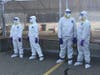 Four members of the Rhode Island National Guard in protective gear. From left: Sgt. Tegan Brown and Sgt. Coral Brown, sisters from Westerly; Spc. Brandon Bessette from Providence and Pvt. Cesar Alvarez of West Warwick.  