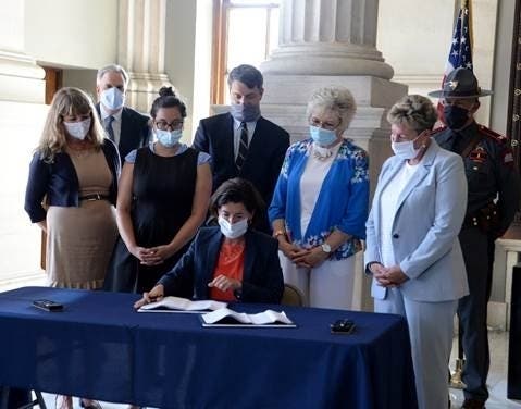 Gov, Gina Raimondo signed a bill into law banning "ghost guns" in the state.