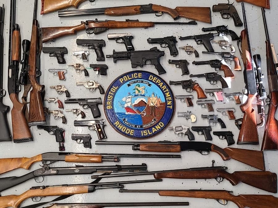 The department collected nearly 100 unwanted guns at the buyback event. 