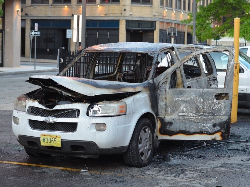 A burned-out vehicle seen in Providence June 3, 2020. This is not believed to be the same vehicle Scaglione lit on fire. 