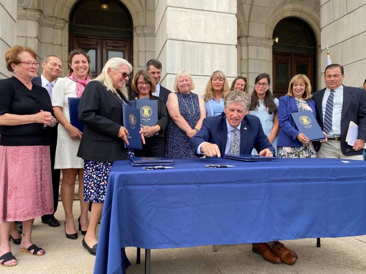 "Today, Rhode Island is closing a number of discriminatory gaps and eliminating a collection of practices that have unfairly impacted women for generations," McKee said. 
