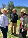 Ranch owner Jim Keegan shares stories with neighbor and former governor Jerry Brown and first lady Anne Gust Brown