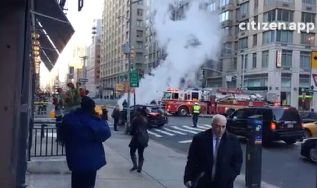 Sixty firefighters responded to multiple manholes smoking on Tuesday morning, FDNY said.