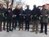 Politicians and neighborhood leaders at a ribbon cutting for Jackson Square Park Tuesday.