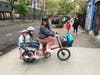 Hannah Clark, who bikes from NoHo to EVCS with her 9- and 5-year-olds.