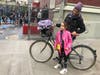 Cresta Kruger with her 6-year-old daughter. Kruger bikes to EVCS along Avenue B from Third Street and Avenue A.