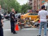 Two different incidents in the East Village left an e-biker hit by a cop car and a teen slashed in the face, cops said.