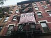 Tenants at 336 W. 17th St. go on a rent strike, they announced at a rally Tuesday.