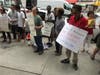 Tenants and advocates rally Wednesday at 207 Canal St.