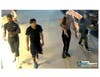 Cops are searching for six people who attacked a man sleeping outside and another man who tried to stop them, police said.
