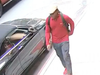 Cops are searching for two men involved in snatching a necklace from a woman sitting in a car, the NYPD said.
