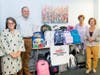 Pediatric Healthcare Associates donates filled backpacks to United Way.  From left, Margo Amgott, United Way Interim CEO, Dr. Nimrod Dayan, PHA Chief Medical Officer,  Dr. Andrea Hagani, PHA CEO & President, Faith Douglass, UW Development Director