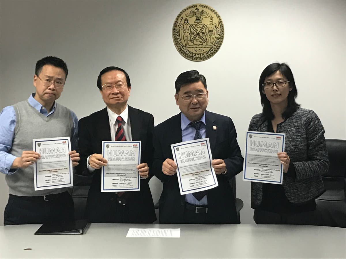 City Council Member Peter Koo, center right, announced a seminar to raise awareness of sex trafficking in Flushing.