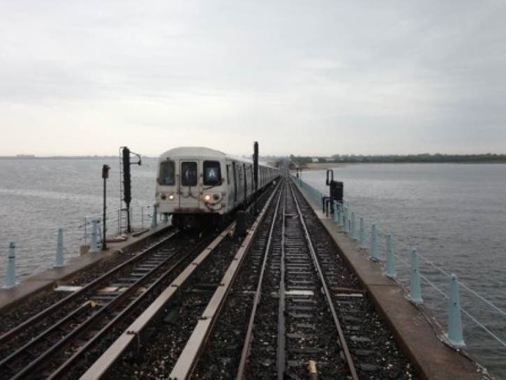 Police are looking for the person who hit a man in the face with a speaker aboard an "A" train in the Rockaways.